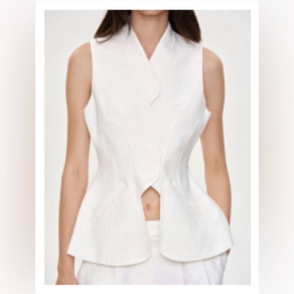 Sleeveless White Peplum Vest Top